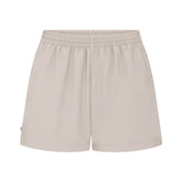 NikeSKIMS WOVEN NYLON 5" TRACK SHORT | STONE