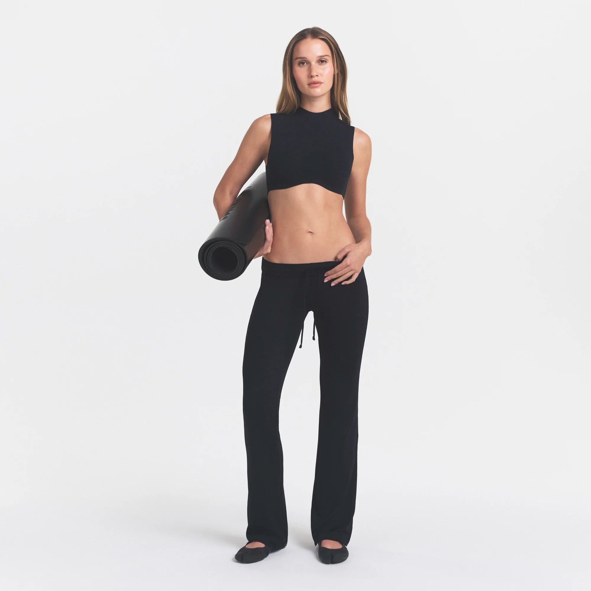 NikeSKIMS AIRY DRI-FIT™ LOW RISE MINI FLARE PANT | OBSIDIAN