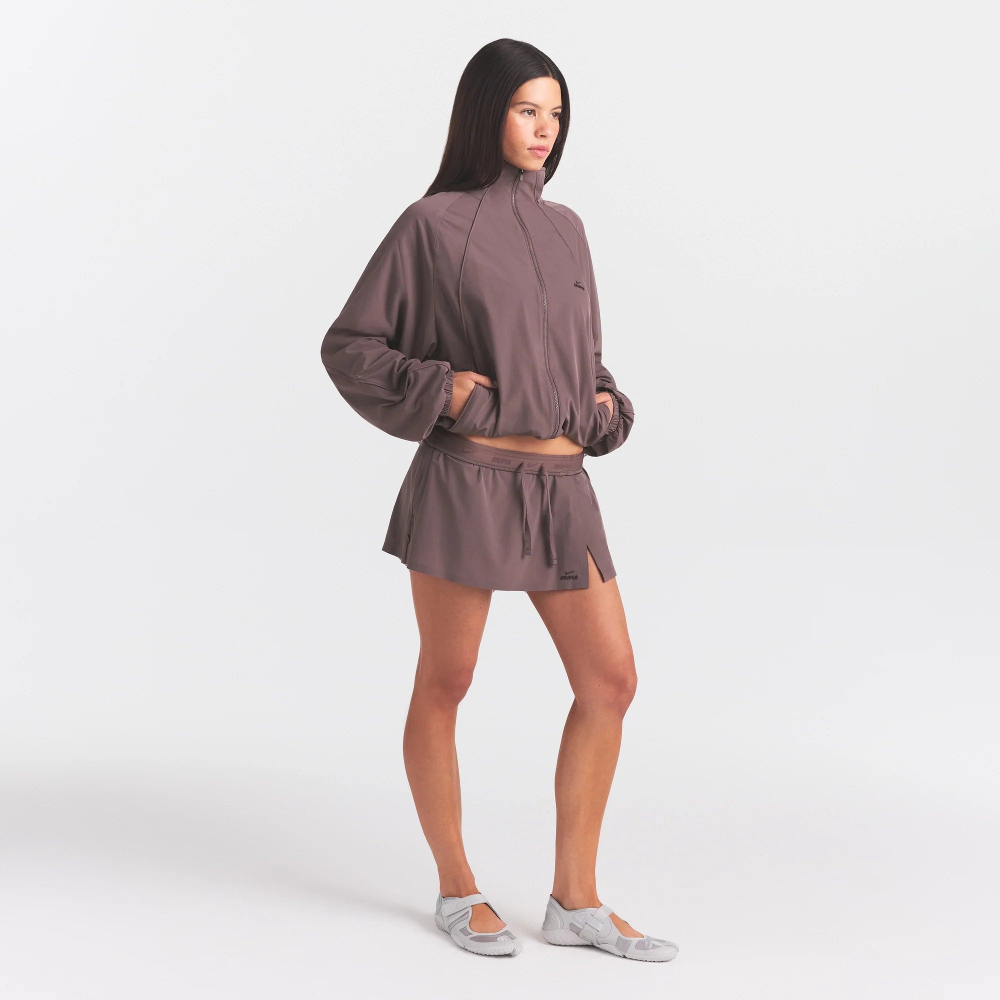 NikeSKIMS STRETCH NYLON OVERSIZED TRACK JACKET | RESIN