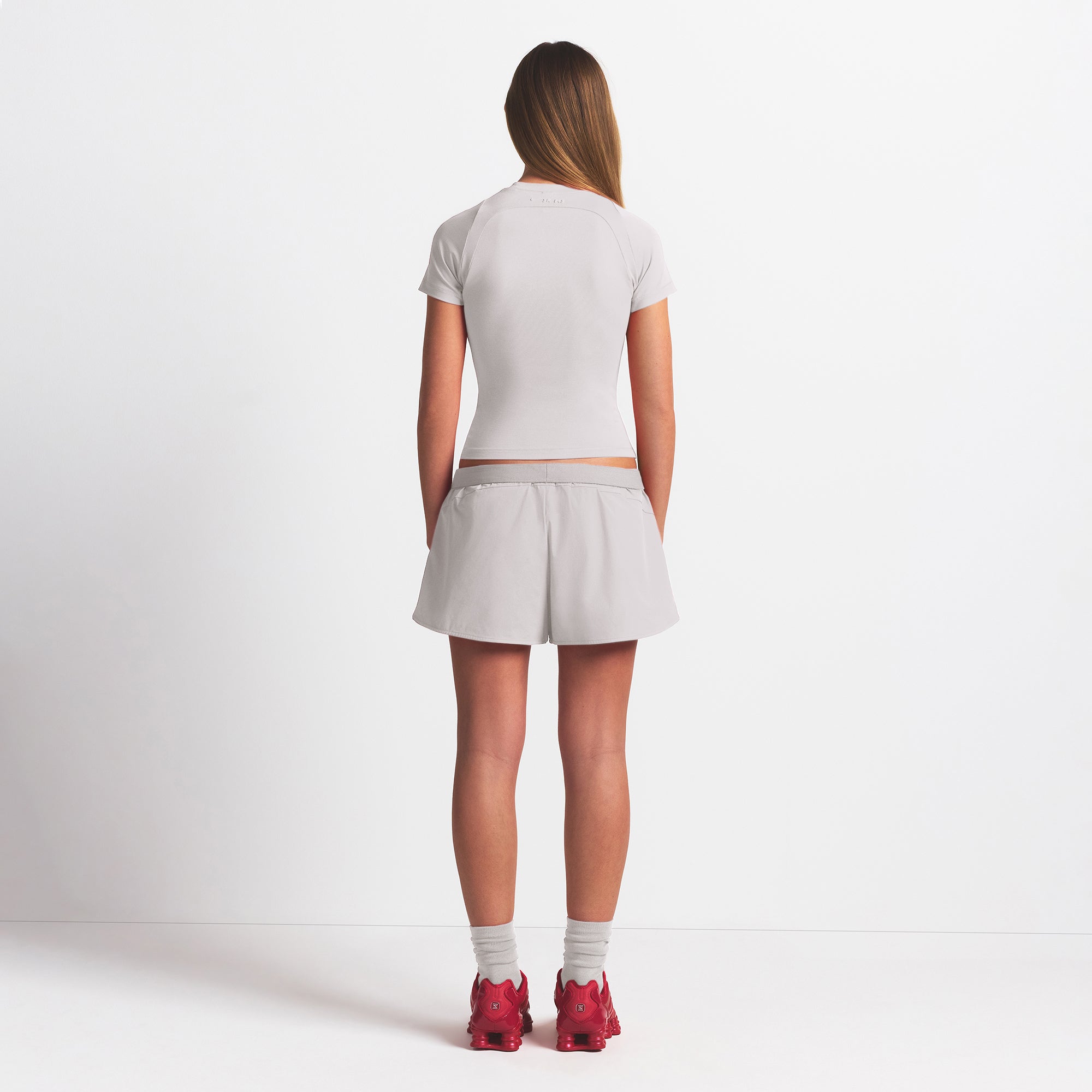 NikeSKIMS WOVEN NYLON 2.5" RUNNER SHORT | STONE