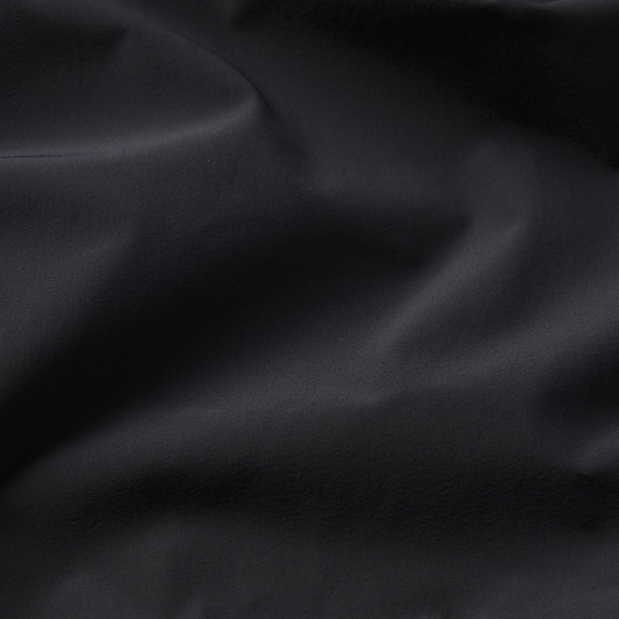 NikeSKIMS WOVEN NYLON OVERSIZED TRACK PANT | OBSIDIAN