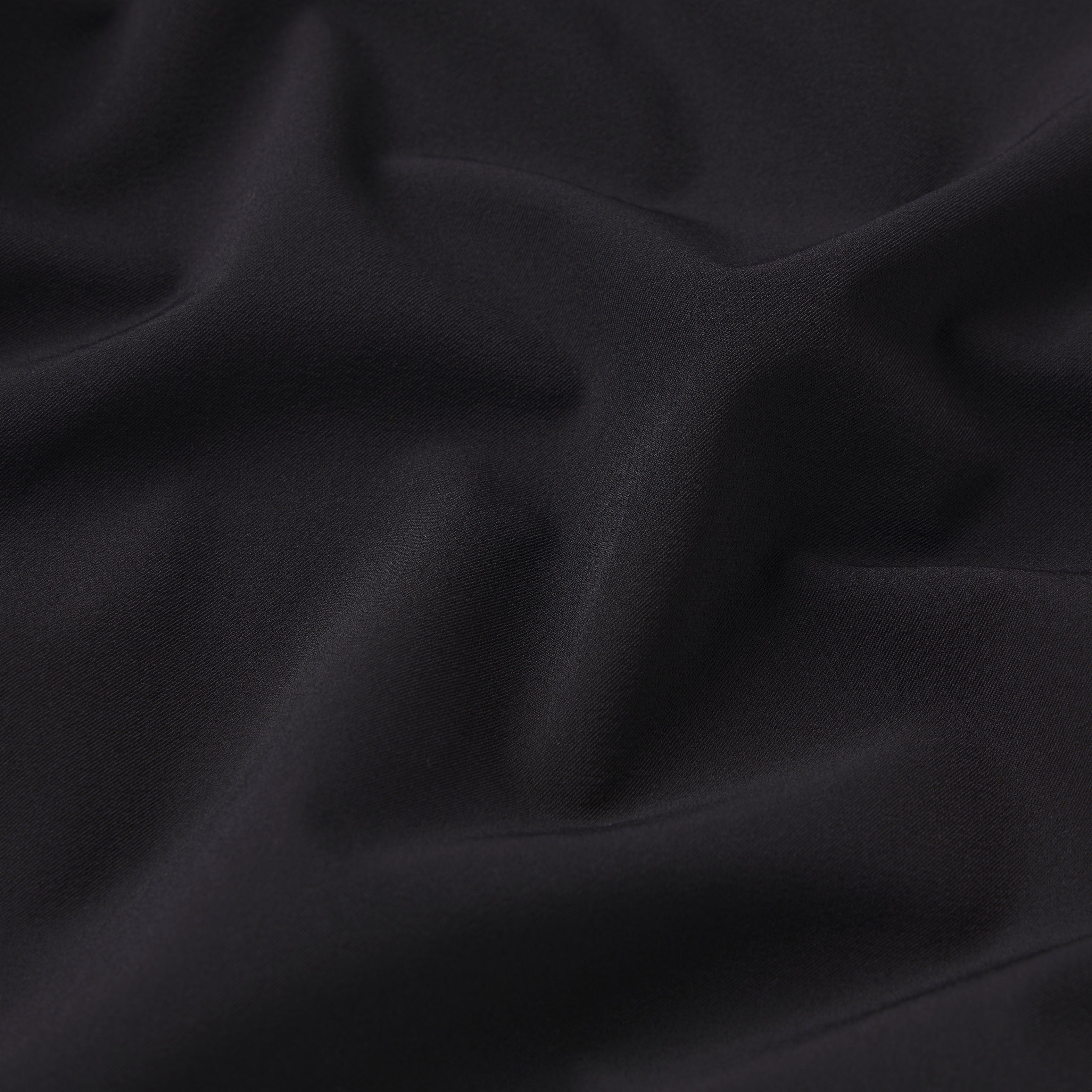 NikeSKIMS STRETCH NYLON OVERSIZED PANT | OBSIDIAN